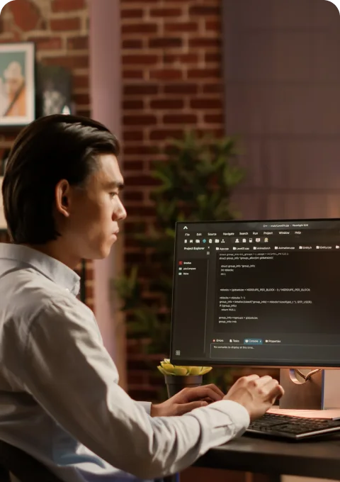 Mobile app developer working on code